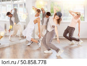 Young girl practicing breakdance in training hall. Стоковое фото, фотограф Яков Филимонов / Фотобанк Лори