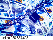 Dollar bills, black lock and metal chain. Money lock or security concept. Account lockout. Стоковое фото, фотограф Емельянов Евгений Викторович / Фотобанк Лори