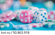 Lucky Roll: A colorful still of dice and chips, conveying the excitement and chance of a casino game. Стоковое AI-изображение, AI-художник Данила Большаков / Фотобанк Лори