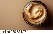 Moisturizing cream in a glass jar on a smooth surface suitable for skincare. Стоковое AI-изображение, AI-художник Katsiaryna Repich / Фотобанк Лори