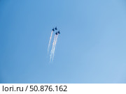 Ufa, Russia, July 17, 2025: The Russian Knights aerobatic team performs a demonstration flight with aerobatic maneuvers. Редакционное фото, фотограф Ирина Толокновская / Фотобанк Лори