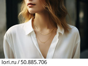 Elegant woman wearing gold necklaces and white shirt. Стоковое AI-изображение, AI-художник Иван Рябоконь / Фотобанк Лори