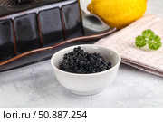 black sturgeon caviar in the bowl. Стоковое фото, фотограф Андрей Старостин / Фотобанк Лори