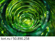 Concentric green glass circles creating stunning visual effect. Стоковое AI-изображение, AI-художник Иван Рябоконь / Фотобанк Лори
