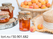 Preservation and summer harvest. Homemade healthy jelly, apricot jam. Preparing jars. Sweets and fruits. Стоковое фото, фотограф Photojuli / Фотобанк Лори