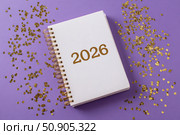 Empty notebook 2026. Purple color background. Blank Greeting Card, Invitation. Minimal Flier Design. Back to life, goal list concept. Resolutions, plan, goals, checklist idea. Top view. New Year. Стоковое AI-изображение, AI-художник Марина Демидюк / Фотобанк Лори