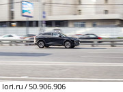 Black Haval F7 car on the city street. Fast moving SUV on urban road with blurred background. Редакционное фото, фотограф Константин Григорьев / Фотобанк Лори