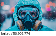 Protection gear during winter, conceptual, Covid-19, biohazard concept: portrait of a person wearing a hazmat suit with a gas mask and goggles in a snowy weather. Стоковое AI-изображение, AI-художник Данила Большаков / Фотобанк Лори