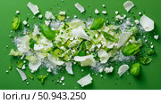 Culinary Concept: Refreshing Cucumber Salad with Feta and Basil against Green backdrop, Fresh and Invigorating. Стоковое AI-изображение, AI-художник Данила Большаков / Фотобанк Лори