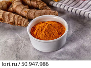 Indian tumeric cumin dry powder. Стоковое фото, фотограф Андрей Старостин / Фотобанк Лори