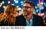 A couple at an event laughing at each other in a joyous moment. Стоковое AI-изображение, AI-художник Данила Большаков / Фотобанк Лори