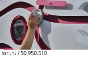 Hand Pressing Button on Interactive Sports Display. Стоковое видео, видеограф Mikhail Davidovich / Фотобанк Лори