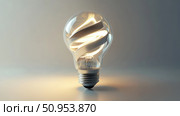 energy spiraling lightbulb ai generated. Стоковое AI-изображение, AI-художник Vectorwin / Фотобанк Лори