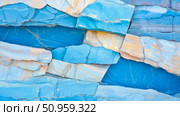 Vibrant geological formation of stacked blue and beige rock stratum, revealing natural patterns and fractured surfaces, ideal for abstract nature presentations. Стоковое AI-изображение, AI-художник Данила Большаков / Фотобанк Лори