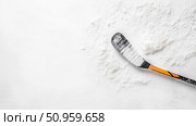 Ice Hockey Stick Blade Resting on a Crisp White Snow-like Surface, Winter Sport Equipment for Athletic Training, Promotional Sport Content. Стоковое AI-изображение, AI-художник Данила Большаков / Фотобанк Лори