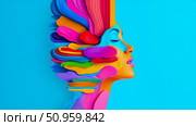 An abstract artistic rendition of a human mind or spirit, featuring a profile portrait composed of layered, vibrant, colorful fluid shapes against a bright blue field. Стоковое AI-изображение, AI-художник Данила Большаков / Фотобанк Лори
