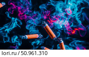 Abstract concept of unhealthy habit: Cigarette butts surrounded by ethereal neon smoke in vibrant pink and blue shades. Стоковое AI-изображение, AI-художник Данила Большаков / Фотобанк Лори