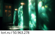 Sunlight reflections create a calming ambiance in a modern green hallway during late afternoon. Стоковое AI-изображение, AI-художник Сергей Толмачёв / Фотобанк Лори