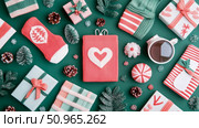 Cozy Holiday Essentials Flat Lay: Festive Christmas Gifting with Knitted Apparel and Warm Beverages, Ideal for Seasonal Promotion. Стоковое AI-изображение, AI-художник Данила Большаков / Фотобанк Лори