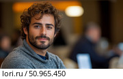 A captivating headshot of a handsome man with brown curly locks and a well-groomed beard, portraying a sense of calm and approachability in a warm indoor setting, ideal for a profile or commercial ad. Стоковое AI-изображение, AI-художник Данила Большаков / Фотобанк Лори