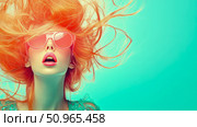 Expressive pop art portrait of a woman with fiery orange hair and trendy pink sunglasses, evoking a summery, playful sensation, perfect for beauty promotion. Стоковое AI-изображение, AI-художник Данила Большаков / Фотобанк Лори