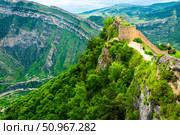 Picturesque mountain landscape with a photofacility tower of the Russian fortress in Gunib. Dagestan, Caucasus (2024 год). Стоковое фото, фотограф Константин Лабунский / Фотобанк Лори