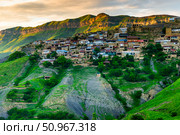 Picturesque view of the mountain village Chokh in the rays of the setting sun. Caucasus. Стоковое фото, фотограф Константин Лабунский / Фотобанк Лори