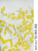 Yellow LED lamps. A scattering of electronic elements. Light-emitting diodes. Стоковое фото, фотограф Valeriy Lushchikov / Фотобанк Лори