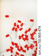 Red LED lamps. A scattering of electronic elements. Light-emitting diodes. Стоковое фото, фотограф Valeriy Lushchikov / Фотобанк Лори
