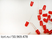 Red LED lamps. A scattering of electronic elements. Light-emitting diodes. Стоковое фото, фотограф Valeriy Lushchikov / Фотобанк Лори