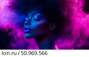 Enigmatic portrait of a woman with luminous blue makeup and glowing skin, framed by vibrant magenta and purple smoke in an artistic, futuristic display. Стоковое AI-изображение, AI-художник Данила Большаков / Фотобанк Лори