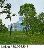 Voronzov Mansion (Novoznamenka Estate, St. Petersburg), blue-and-white Baroque palace by Trezzini and Rinaldi, summer view with green meadow. Стоковое фото, фотограф Елена  Попкова / Фотобанк Лори