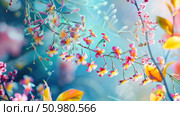 A group of colorful flowers clustered together and hanging from a tree branch in a natural setting. Стоковое AI-изображение, AI-художник Данила Большаков / Фотобанк Лори