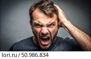 Irritated Man With Hand on Head Against Grey Background. Generative AI. Стоковое AI-изображение, AI-художник Roman Zavorotny / Фотобанк Лори