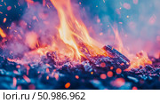 Vibrant close-up of smoldering embers and dancing flames with colorful smoke and glittering sparks, creating intense, ethereal abstract fire art. Стоковое AI-изображение, AI-художник Данила Большаков / Фотобанк Лори