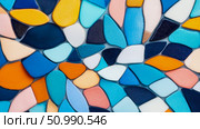 Abstract Colorful Stone Mosaic: A Textured Background of Irregular Shapes in Blues, Oranges, and Whites. Стоковое AI-изображение, AI-художник Данила Большаков / Фотобанк Лори