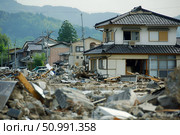 Earthquake-damaged homes in a suburban neighborhood, demonstrating the effects of natural disasters. For educational, insurance, and construction materials. Стоковое AI-изображение, AI-художник Лариса Пономарева / Фотобанк Лори