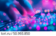 Neon-lit Fingertips Interacting with a Futuristic Interface. Стоковое AI-изображение, AI-художник Данила Большаков / Фотобанк Лори