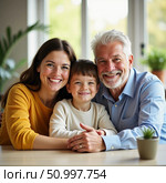 Smiles light up the room as a grandmother and grandfather embrace their grandson, creating cherished memories in their bright, welcoming home during a sunny afternoon Generative AI. Стоковое AI-изображение, AI-художник Юлия Петровская / Фотобанк Лори