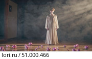 Meditating male finding inner peace, surrounded by misty ambiance and blooming lotus flowers, embodying spiritual calm and mindful reflection. Стоковое AI-видео, аниматор Данил Руденко / Фотобанк Лори
