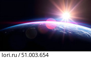 View of Earth planet with light lens from cosmos. Стоковое AI-изображение, AI-художник Андрей Митин / Фотобанк Лори