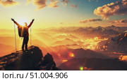 A hiker stands on a rocky peak, enjoying a vibrant sunset over the majestic Rocky Mountains and the layers of clouds below. Стоковое AI-видео, аниматор Данила Большаков / Фотобанк Лори