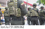 Colombian soldiers heading to war, Armed military unit advancing in formation, Combat troops on mission in conflict zone. Редакционное видео, видеограф ALEJANDRO PEREZ ALVARES / Фотобанк Лори