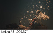Child performs music on cello surrounded by glowing stars in a magical setting at night. Стоковое AI-видео, аниматор Сергей Толмачёв / Фотобанк Лори