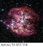 The luminous, hot star Wolf-Rayet 124 surrounded by a nebula of expelled material known as M1-67. Стоковое фото, фотограф Stocktrek Images, Inc. / ТАСС / Фотобанк Лори
