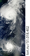 Two powerful storms span the Atlantic Ocean. Стоковое фото, фотограф Stocktrek Images, Inc. / ТАСС / Фотобанк Лори