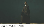 Woman in black gown walks gracefully, blindfolded against a dark backdrop in an artistic expression of vulnerability and strength. Стоковое AI-видео, аниматор Сергей Толмачёв / Фотобанк Лори