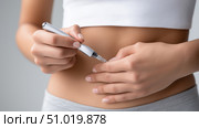 Close-up of Hands Injecting Insulin Pen into Abdomen, GLP-1 Self-Injection Concept. Стоковое AI-изображение, AI-художник Katsiaryna Repich / Фотобанк Лори