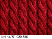 Red sweater texture background, cable knit pattern, intricate textures. For design projects, product presentation. Soft Knitted Woolen Detailed Pattern. Natural Fabric Knitwear, Warm Cashmere Surface. Стоковое AI-изображение, AI-художник Марина Демидюк / Фотобанк Лори