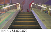 Tokyo, Japan - Oct 13 2024, 4k, a view of people going up on the escalator in the shopping mall, Tokyo, Japan. Редакционное видео, видеограф Сергей Богомяко / Фотобанк Лори